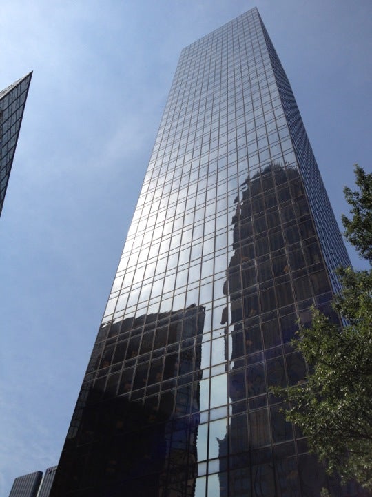 Tall modern skyscraper low angle glass facade