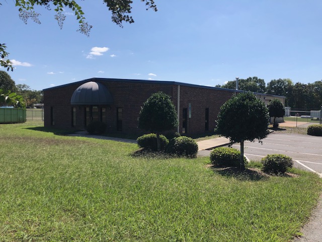 Modern black brick commercial building